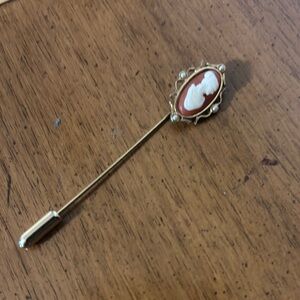 Avon Gold and White Brooch with Filigree Design